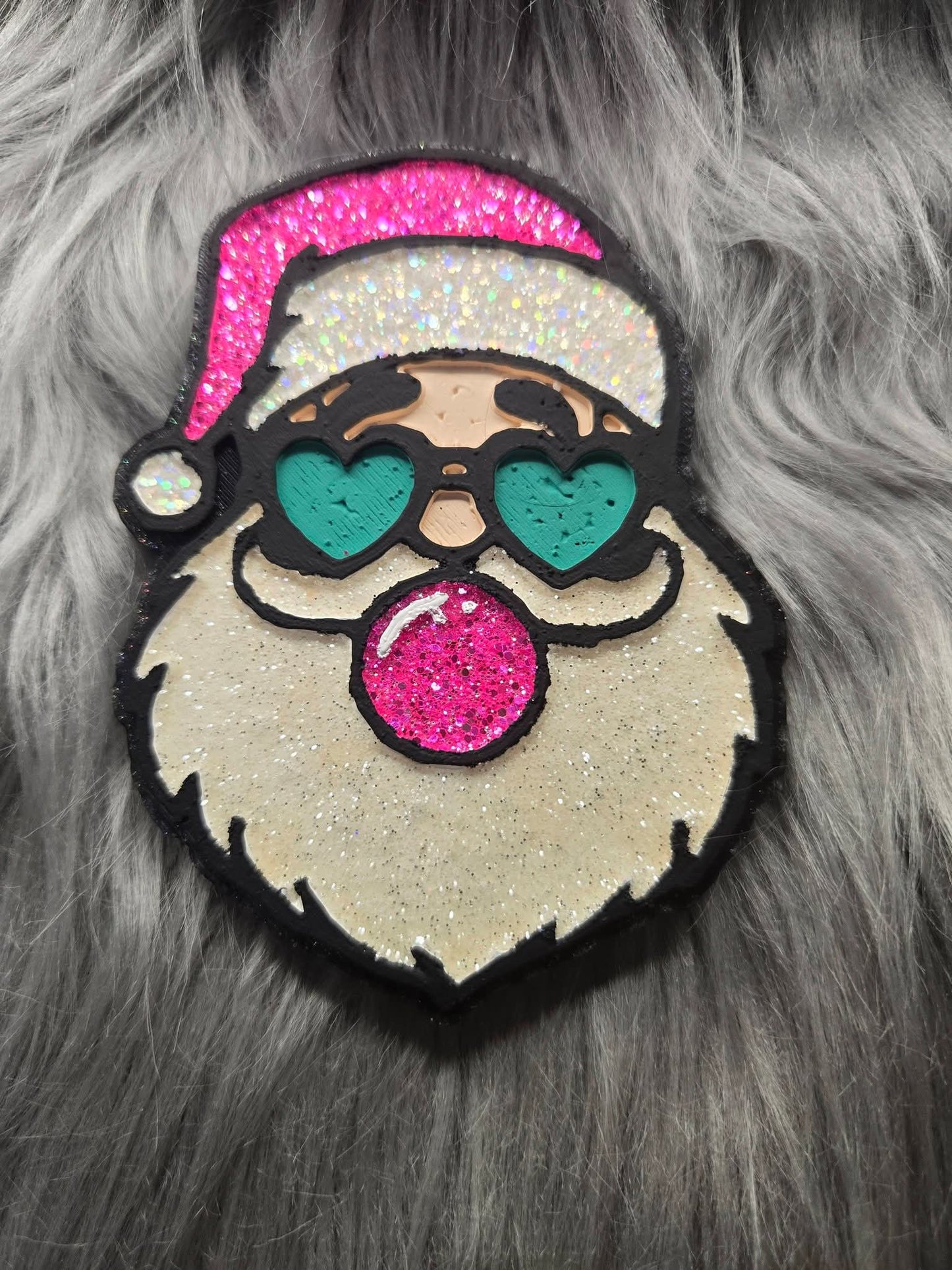 Santa blowing bubble