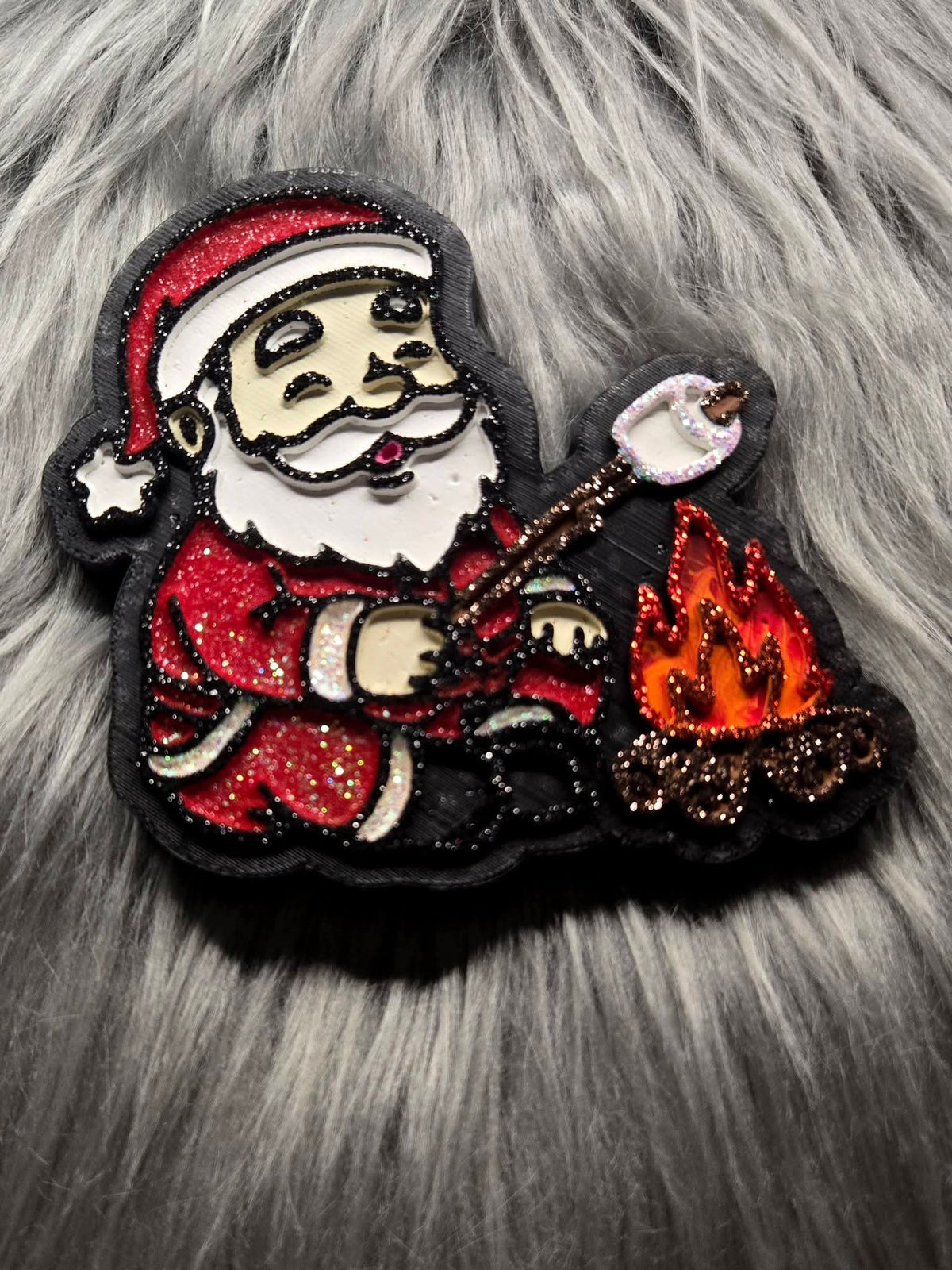 Santa roasting a marshmallow