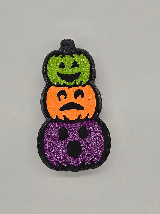 Stacked jack-o-lanterns