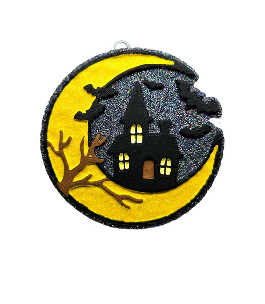 Haunted house in the moonlight